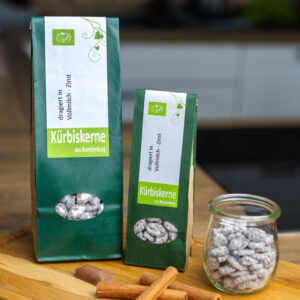 Kürbiskerne dragiert in Vollmilchschokolade mit Zimt
